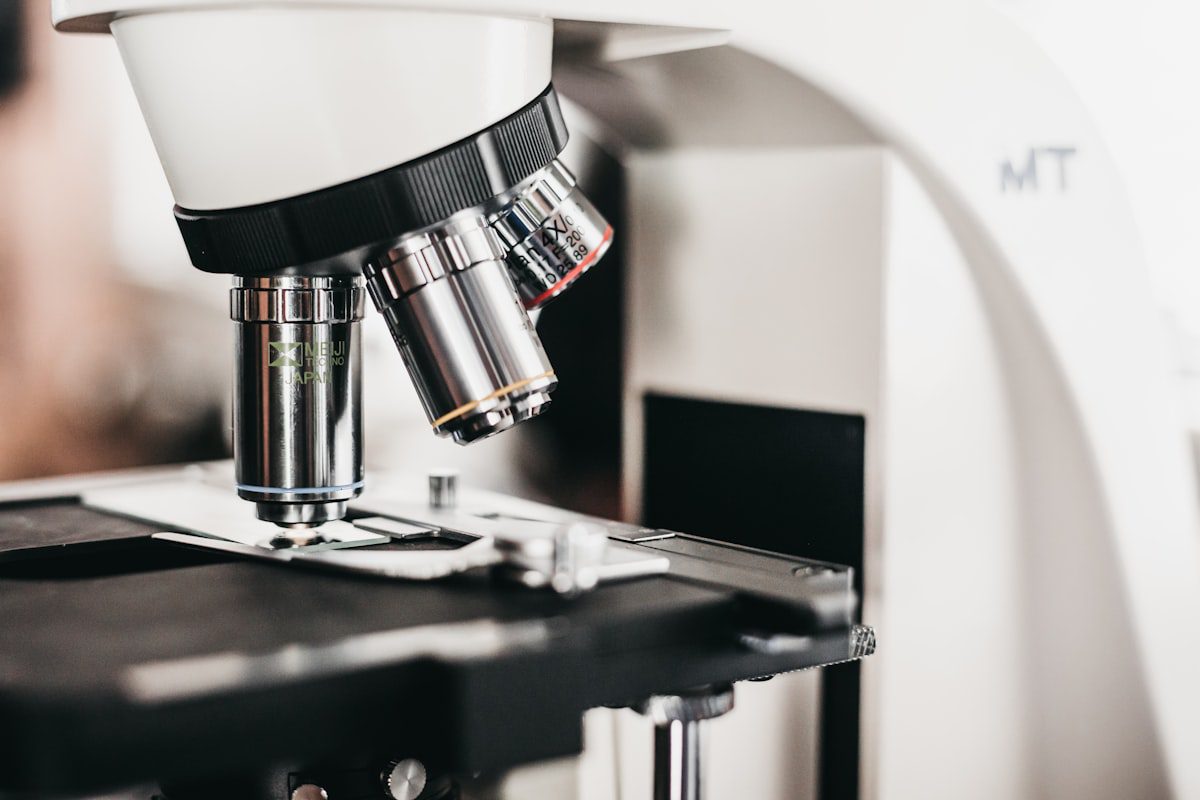 AOD-9604 peptide research under laboratory microscope